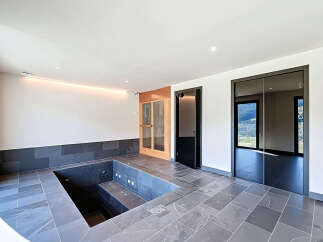 Discover luxury living in this stunning property featuring a private indoor pool.