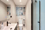 Step into a modern oasis with this stylish bathroom design.