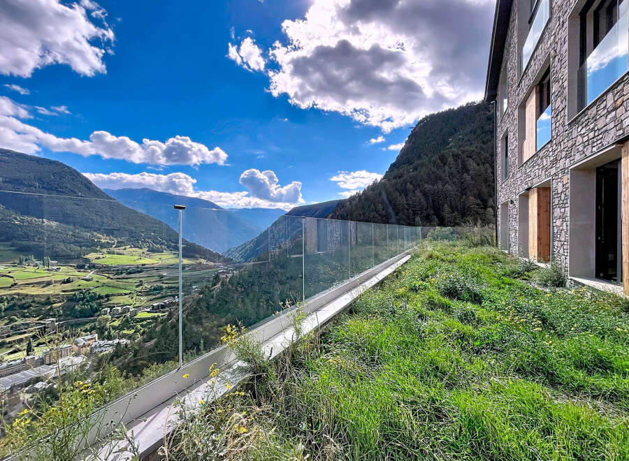 Experience breathtaking mountain views from this stunning property.