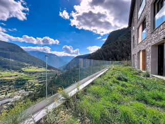 Experience breathtaking mountain views from this stunning property.
