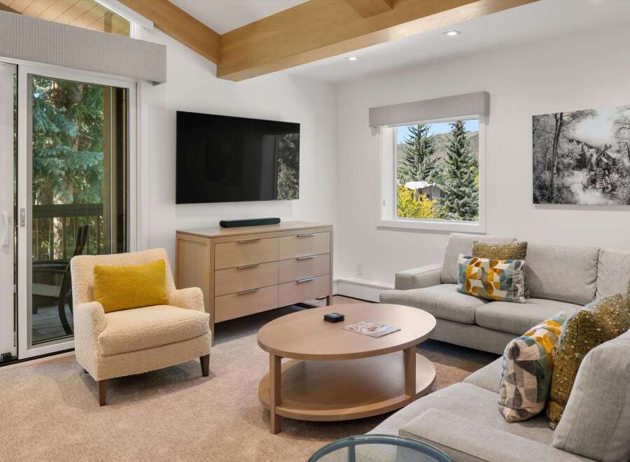 This stunning living room boasts a modern design with a touch of elegance.