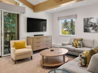 This stunning living room boasts a modern design with a touch of elegance.