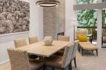 This stunning dining room showcases a modern design with a touch of rustic charm.