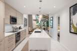 Experience modern luxury in this stunning kitchen.