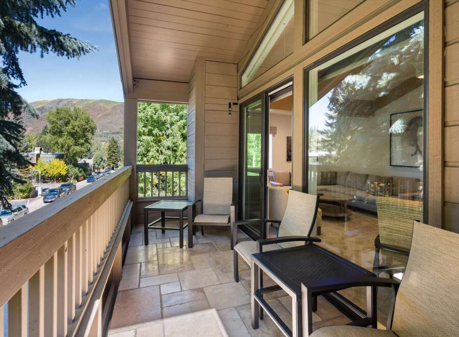 Enjoy breathtaking mountain views from this stunning balcony.