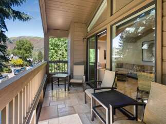 Enjoy breathtaking mountain views from this stunning balcony.