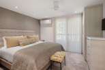 Step into a serene bedroom retreat, perfect for relaxation and rejuvenation.