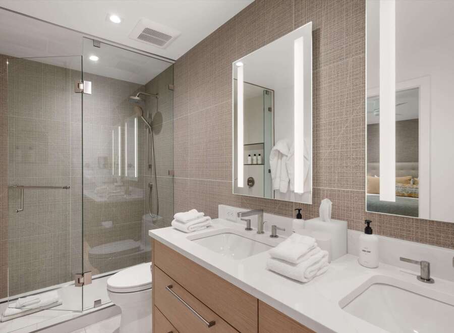 Step into luxury with this stunning bathroom featuring a modern design and high-end finishes.