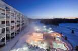 Experience the ultimate winter getaway at this stunning property! Featuring multiple outdoor hot tubs and a modern building, this location offers a unique blend of relaxation and luxury.