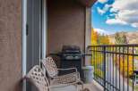 Enjoy the stunning mountain views from this charming balcony.