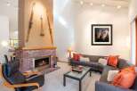 This stunning property boasts a cozy living room with a brick fireplace, perfect for those chilly evenings.