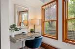 This stunning property boasts a beautifully designed vanity area, perfect for getting ready in style.