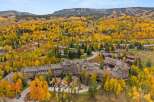 Discover the epitome of mountain living in this stunning property, nestled amidst a vibrant tapestry of fall foliage.