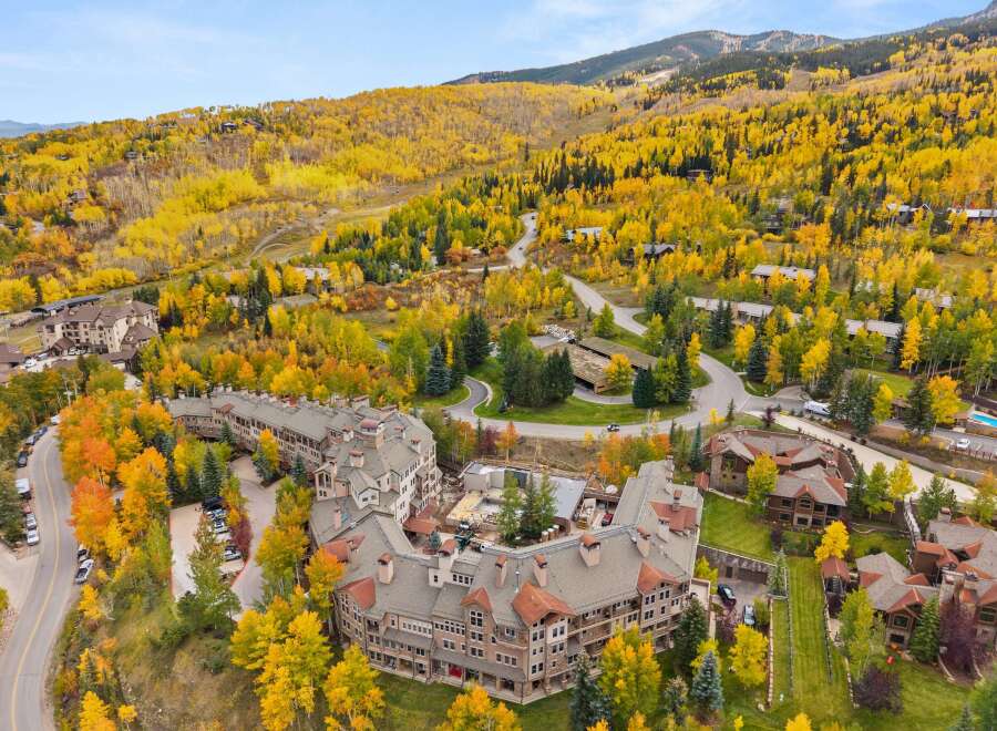 Experience luxury living in this stunning property nestled amidst the vibrant autumn foliage.