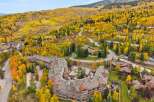 Experience luxury living in this stunning property nestled amidst the vibrant autumn foliage.