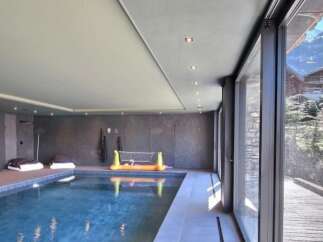 Indulge in luxury with this stunning indoor pool, perfect for year-round enjoyment.