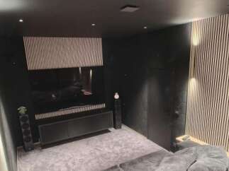Experience the ultimate home theater experience in this stunning property! Featuring a sleek, modern design with a large screen, surround sound, and comfortable seating, this space is perfect for movie nights and entertaining.