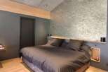 Discover the epitome of modern comfort in this stylish bedroom.