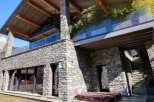 Discover luxury living in this stunning stone-clad property.