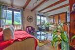 Experience the charm of this stunning property, boasting breathtaking mountain views and a cozy interior.