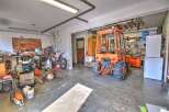 This spacious garage offers ample storage and workspace for various projects.