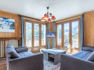 Experience the charm of this cozy living space, perfect for relaxation and entertainment.