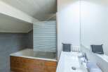 Discover a cozy bathroom with a unique design.