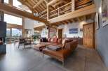 Experience luxury living in this stunning property featuring a spacious living area with a cozy fireplace.