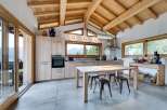 Experience the epitome of modern living in this stunning kitchen, featuring a seamless blend of natural wood elements and contemporary design.