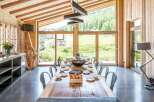 This stunning dining room boasts a rustic yet modern design, perfect for entertaining.