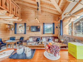 Experience the charm of this cozy chalet, perfect for a mountain getaway.