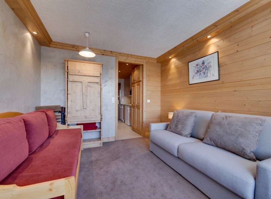 Discover the charm of this cozy living space, perfect for relaxation and entertaining.