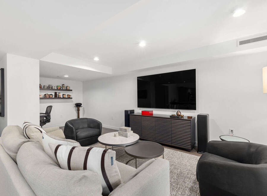 Step into modern luxury with this stunning living space.