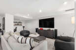Step into modern luxury with this stunning living space.
