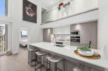 Experience luxury living in this stunning modern kitchen.