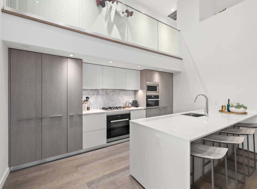 Experience modern luxury in this stunning kitchen.