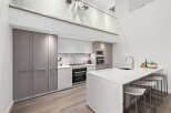 Experience modern luxury in this stunning kitchen.