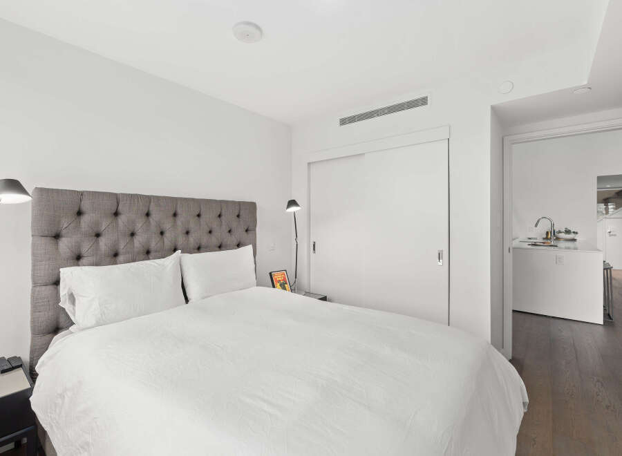Experience modern luxury in this stunning bedroom.