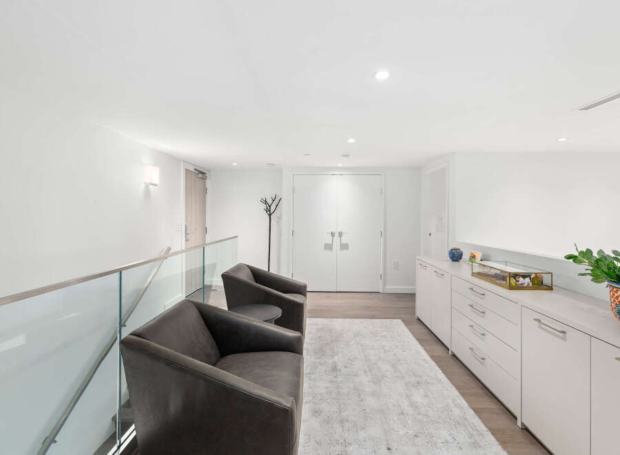 Step into modern elegance with this stunning property, featuring a bright and airy interior.