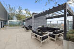 Enjoy breathtaking city views from this stunning rooftop patio.