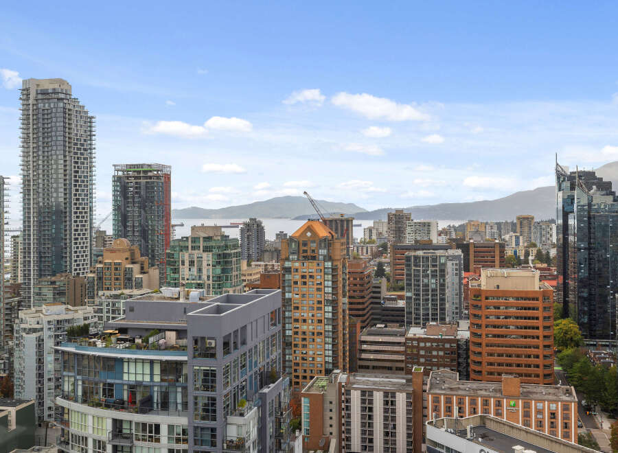 Experience the vibrant city life from this stunning high-rise property.