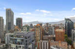 Experience the vibrant city life from this stunning high-rise property.