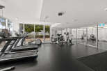 This modern fitness center offers a bright and spacious environment for your workout routine.