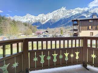 Enjoy breathtaking mountain views from this charming property.