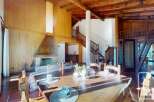 Experience the charm of this stunning property, featuring a cozy fireplace and a spacious dining area perfect for gatherings.