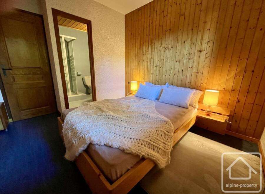 Discover a cozy bedroom retreat in this charming property.