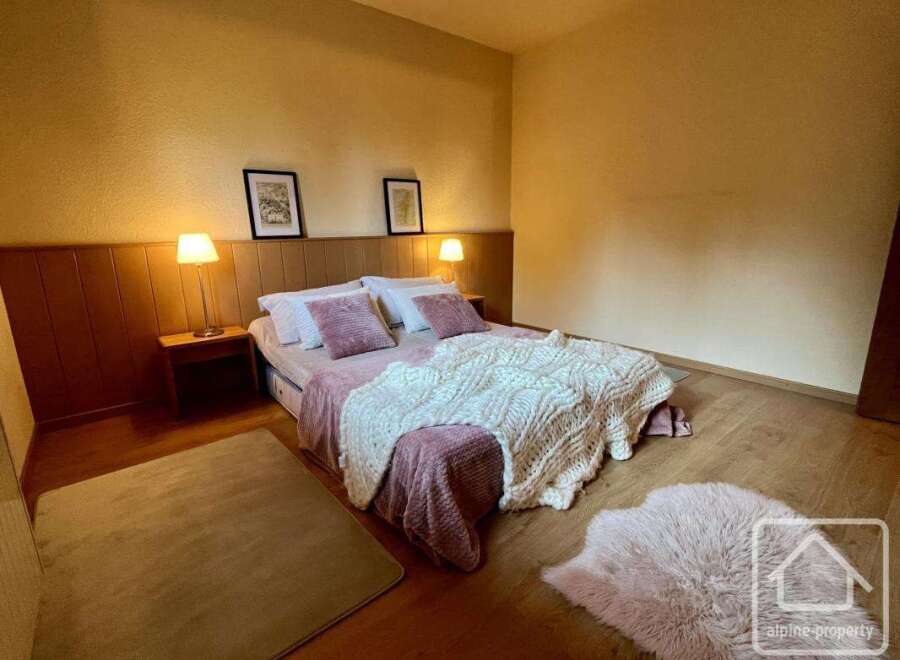 Discover the charm of this inviting bedroom, perfect for relaxation.