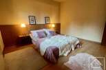 Discover the charm of this inviting bedroom, perfect for relaxation.