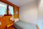 Discover a cozy single bedroom retreat, perfect for a peaceful getaway.