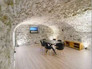 Discover the unique charm of this property, featuring a stunning stone-walled interior.